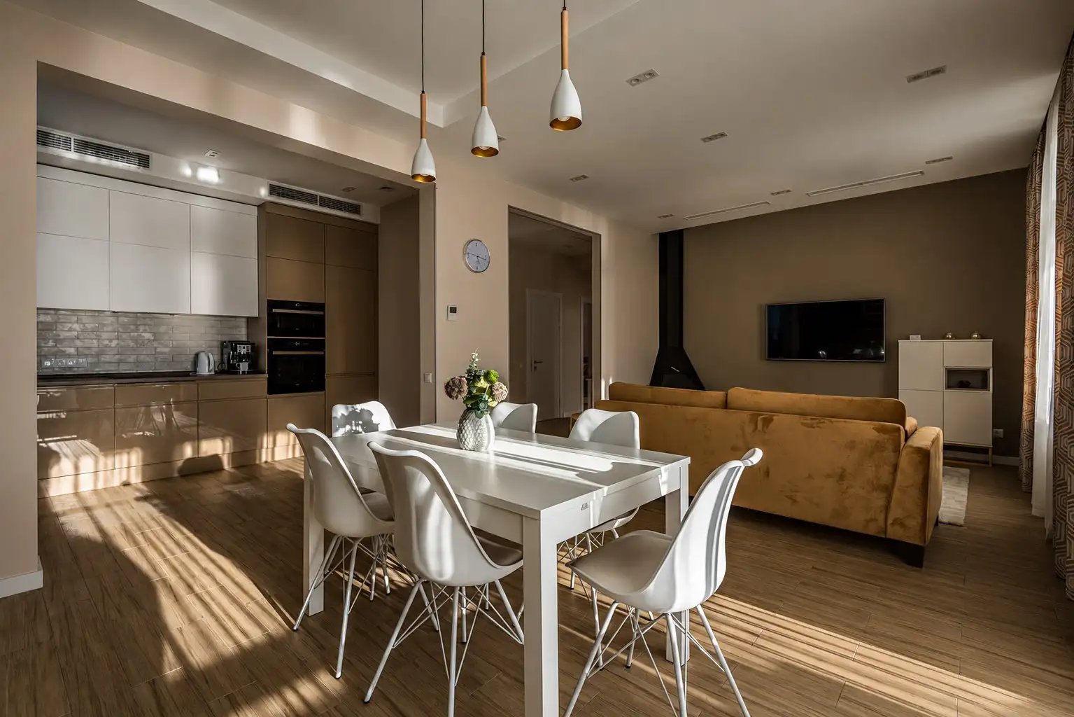 Living and dining space inside an Urban Pinnacle residence
