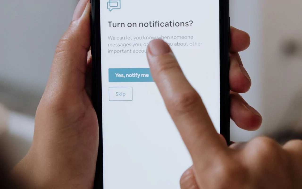 Resident enabling app notifications on a tablet